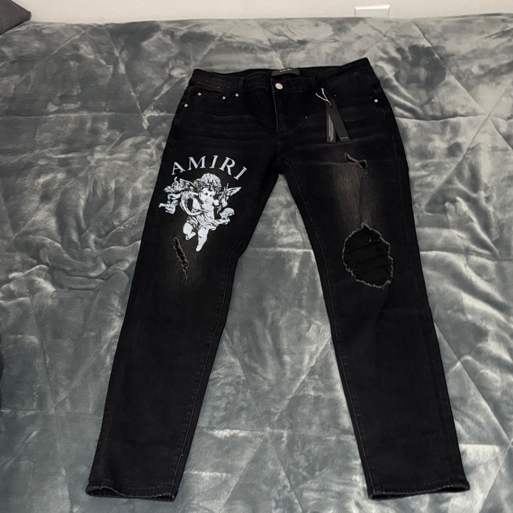 AMIRI Black Jeans with White Graphic and Distressed Details